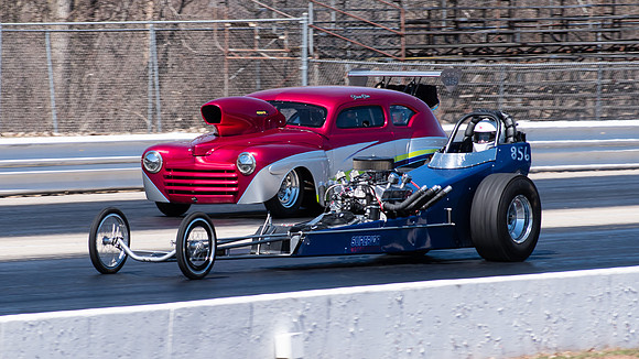 Two cars making a run